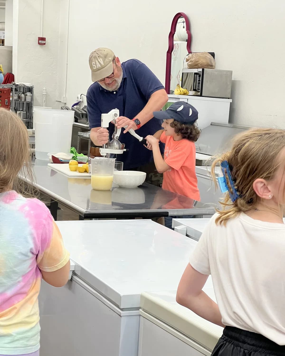 Girl Scouts taking part in a hands-on pop-making demonstration